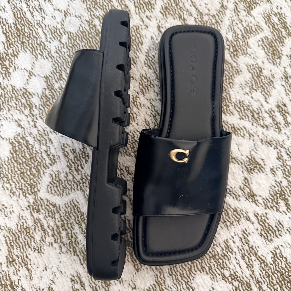 Coach Black Slide Sandals with Gold Detail. Like new and very comfortable.
